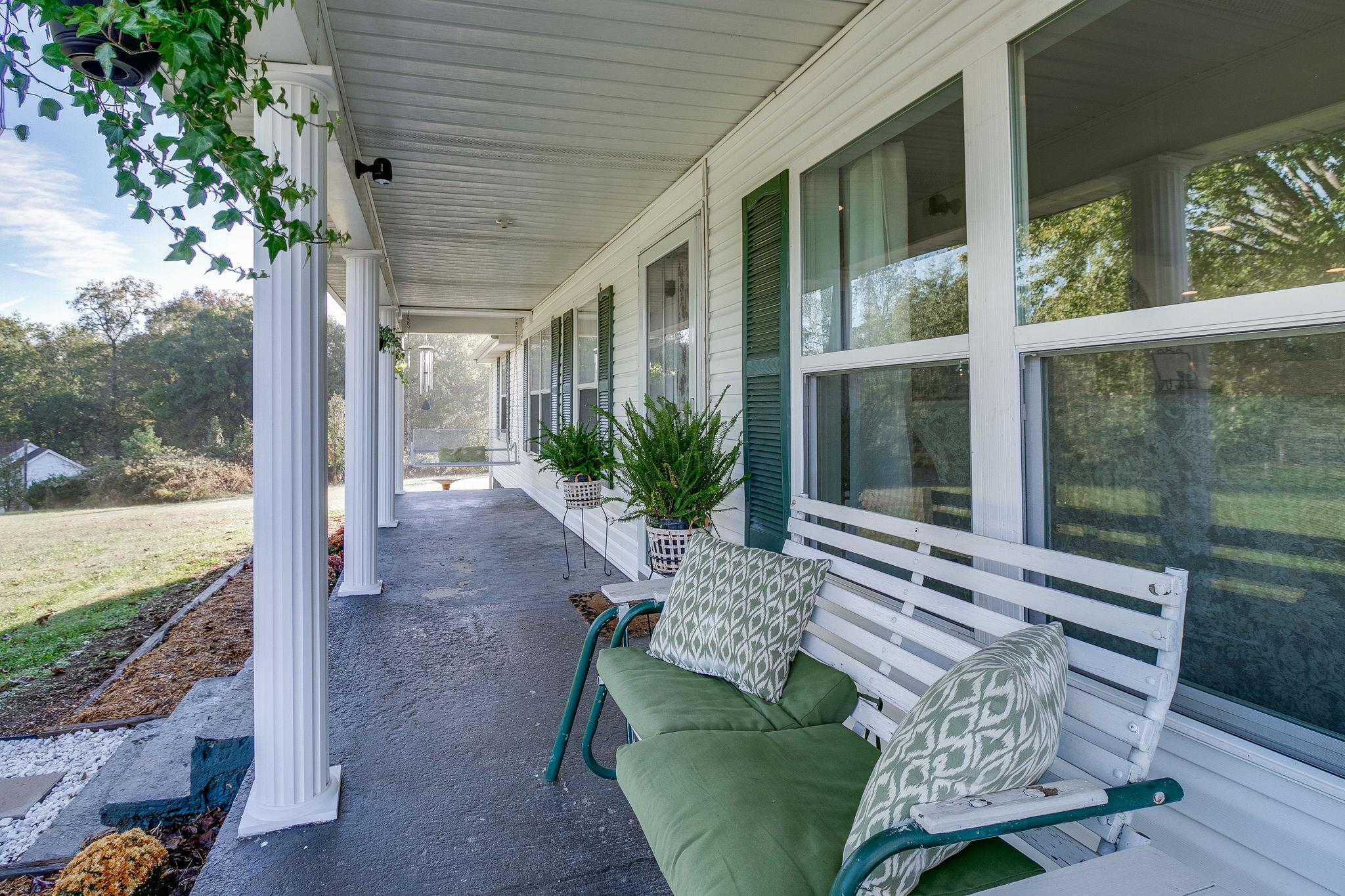 385 Ben Albert Road Cottontown, TN 37048 - Photo 7 of 27 There will be lots of swinging and rocking going on here!