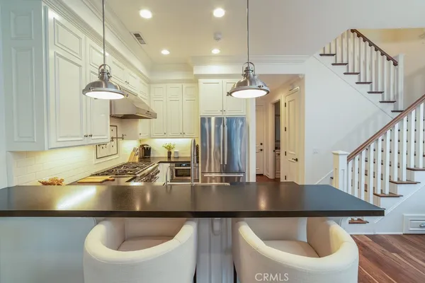 a living room with furniture fireplace and a flat screen tv