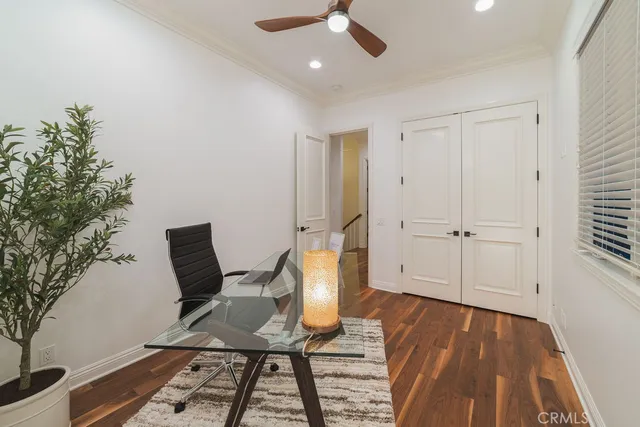 a bathroom with a double vanity sink toilet mirror and shower