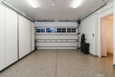 a view of a potted flower in the corridor