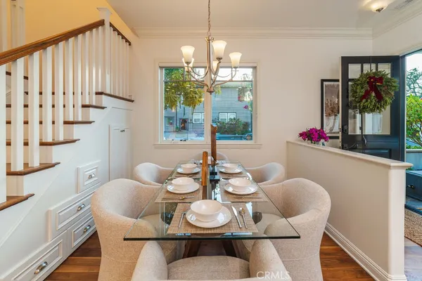 a kitchen with stainless steel appliances a stove a sink and a refrigerator
