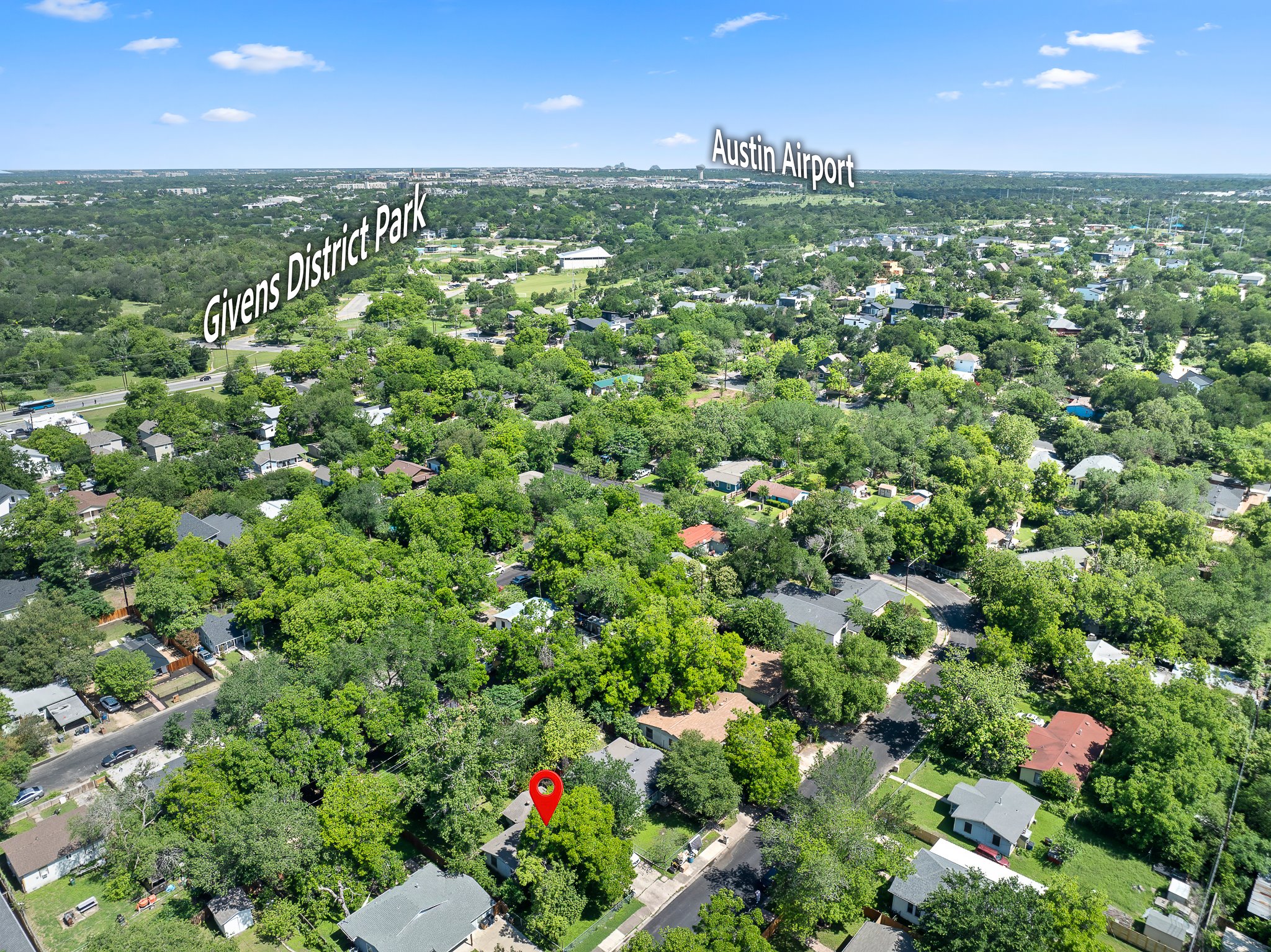 1122 Spur Street, Unit D Austin, TX 78721 - Photo 5 of 6 Aerial perspective of a tree-lined neighborhood