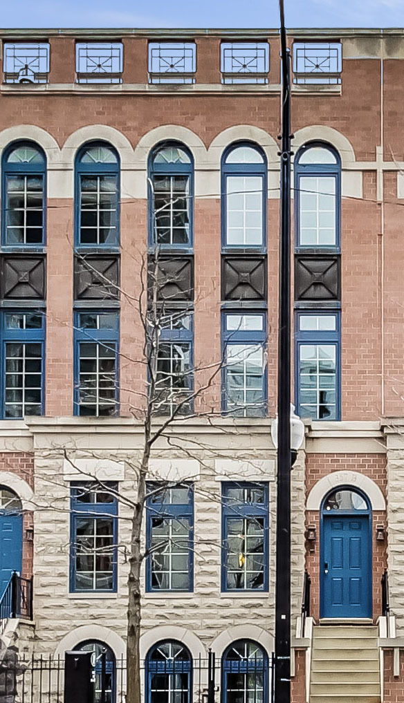 357 West Superior Street, Unit AB Chicago, IL 60654 - Photo 1 of 50 front view of two brick house with a roof