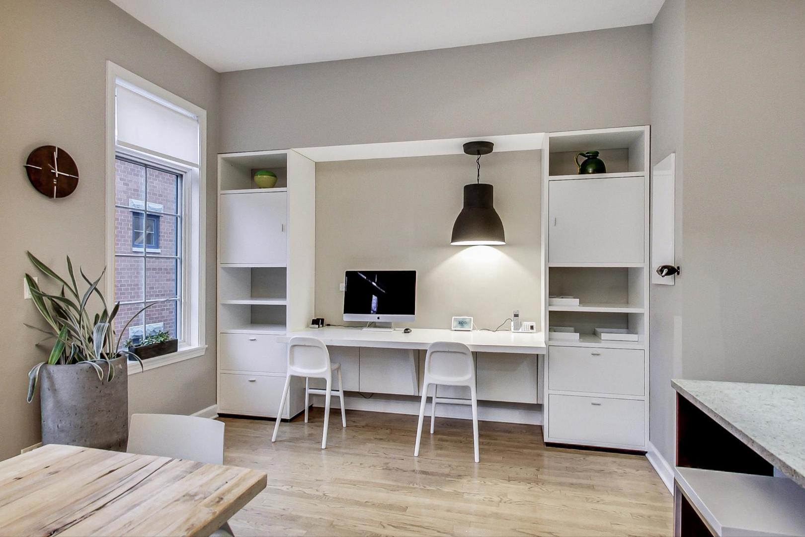 357 West Superior Street, Unit AB Chicago, IL 60654 - Photo 14 of 50 a workspace with furniture and wooden floor