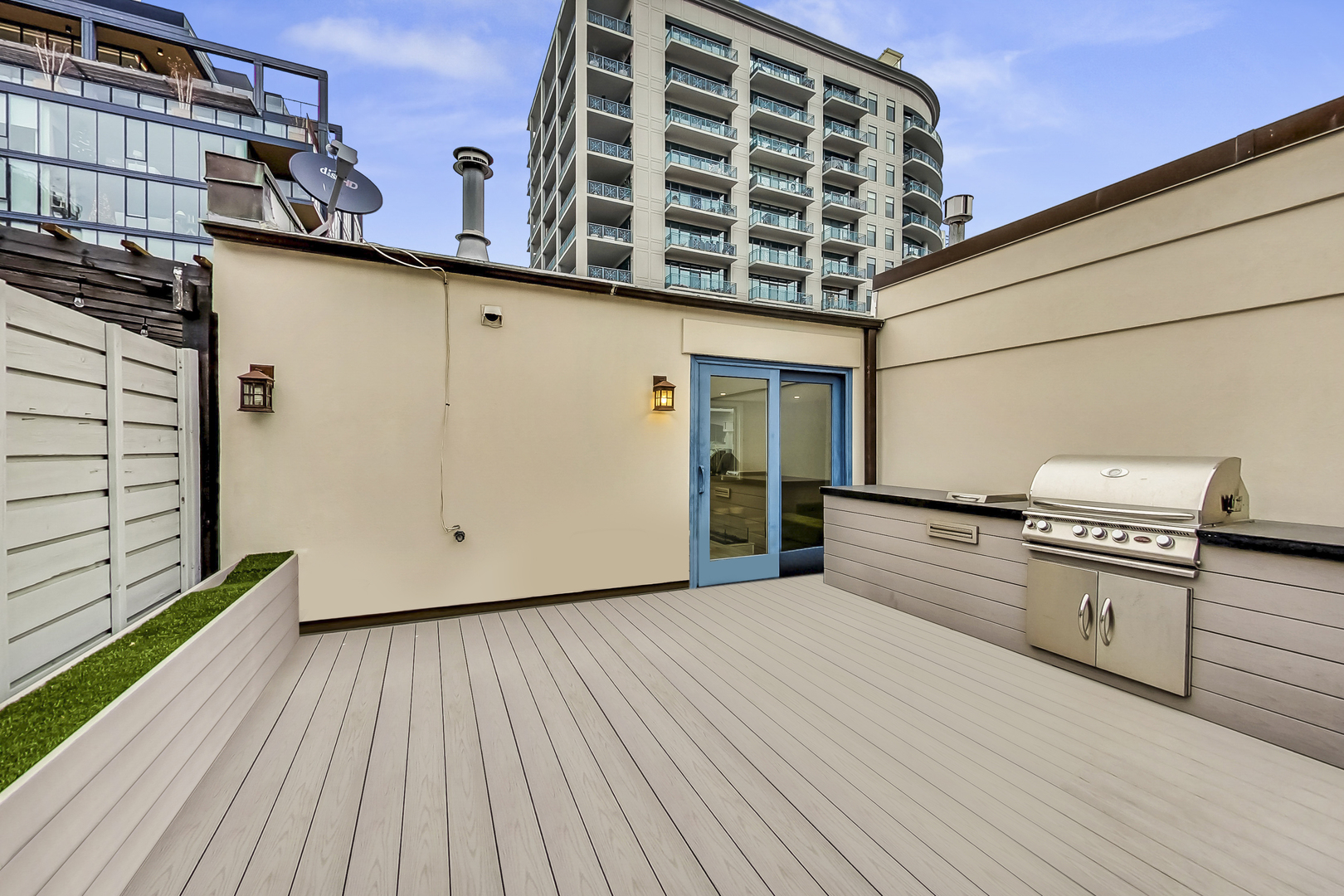 357 West Superior Street, Unit AB Chicago, IL 60654 - Photo 33 of 50 a view of a balcony with wooden floor