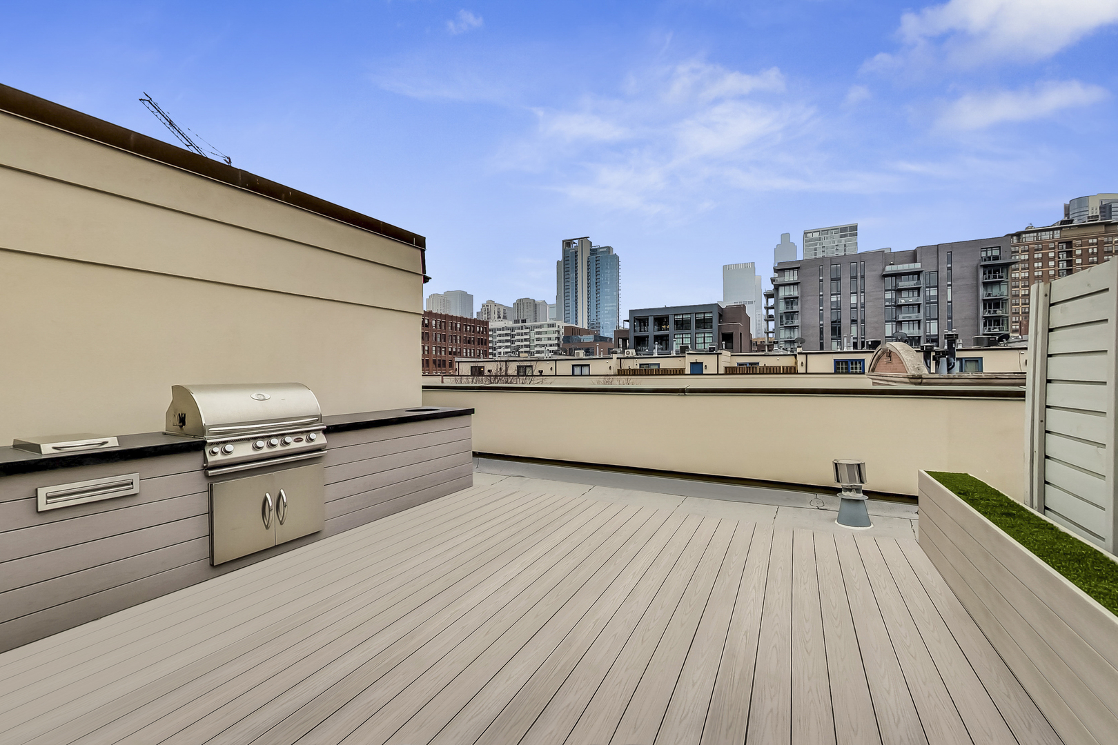 357 West Superior Street, Unit AB Chicago, IL 60654 - Photo 34 of 50 a view of a terrace with wooden floor and seating space