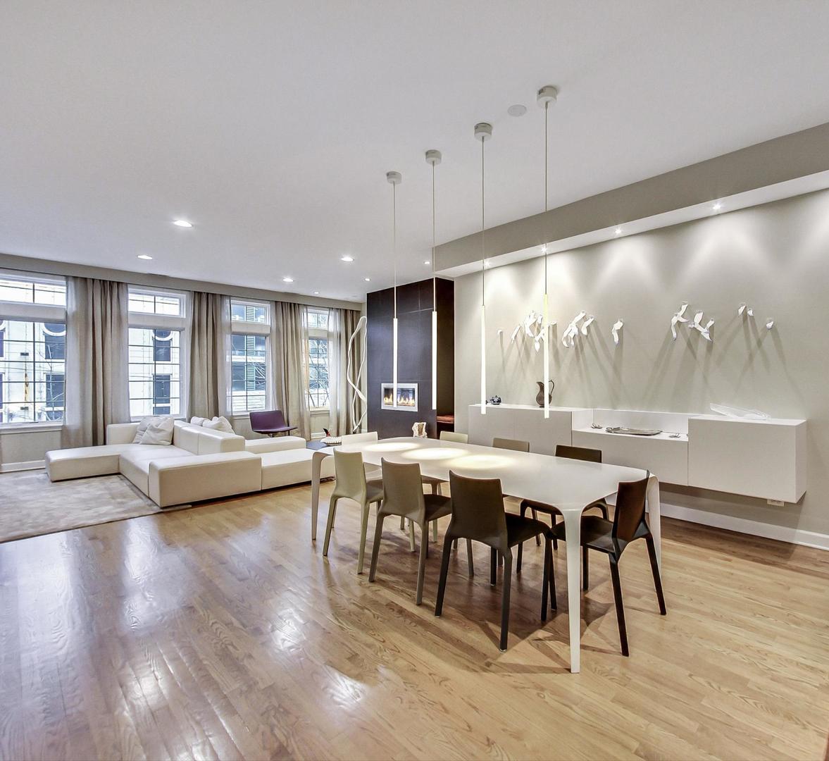 357 West Superior Street, Unit AB Chicago, IL 60654 - Photo 9 of 50 a view of a dining room with furniture window and wooden floor