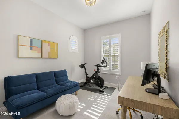 a living room with furniture and a window