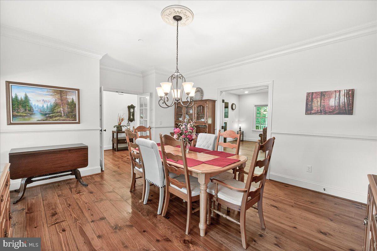 2516 Daisy Road Woodbine, MD 21797 - Photo 27 of 78 Charming dining space with rustic warmth.