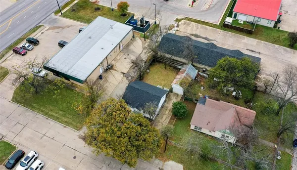 an aerial view of residential house with outdoor space