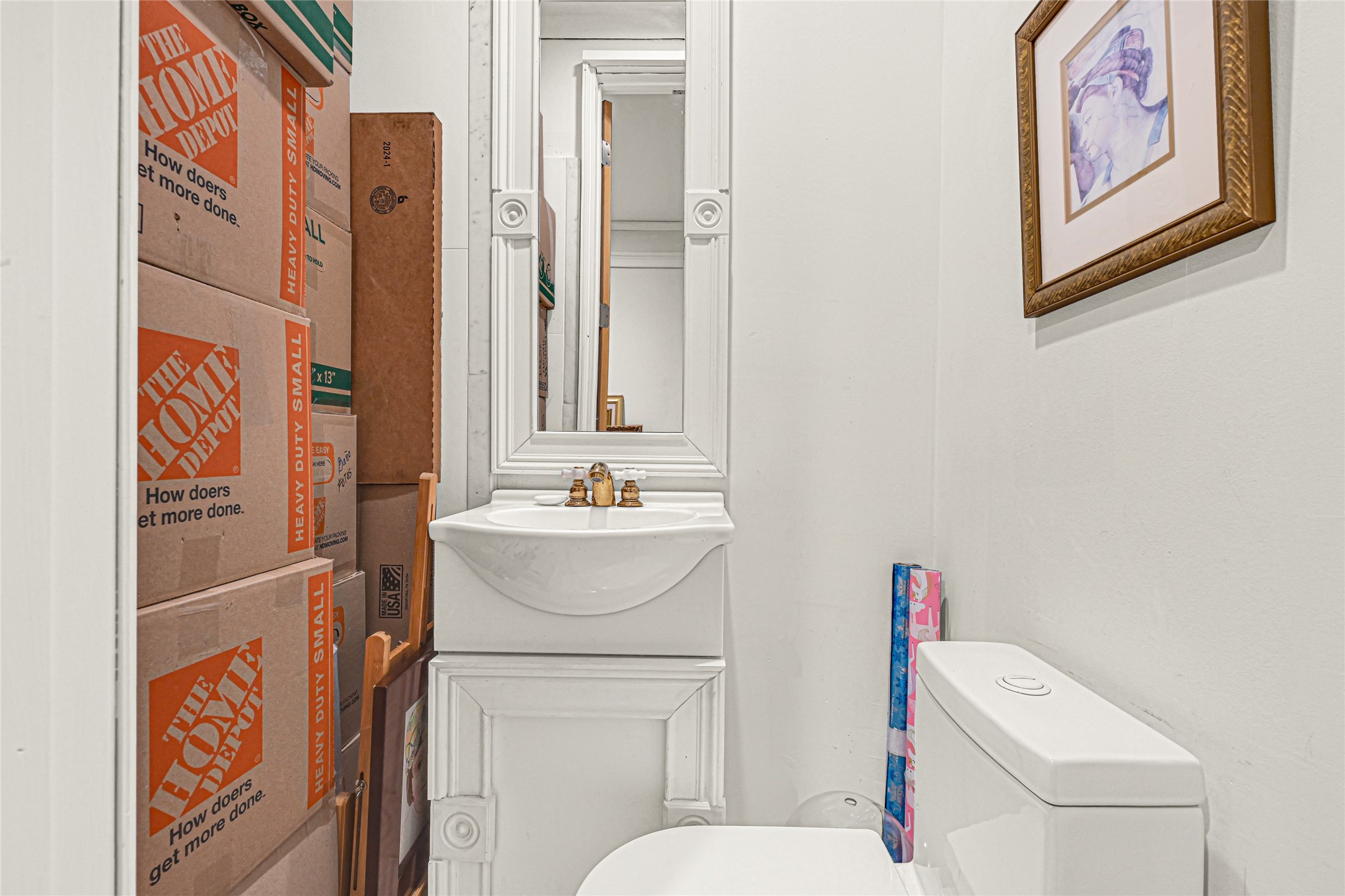 5925 Almeda Road, Unit 10908 Houston, TX 77004 - Photo 4 of 37 a bathroom with a toilet sink and mirror