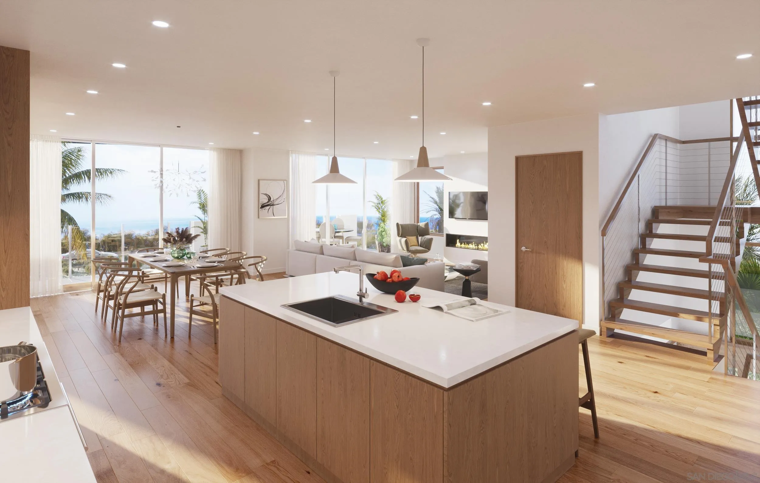 6479 Surfside Lane Carlsbad, CA 92011 - Photo 4 of 14 a kitchen with a table chairs stove and wooden floor