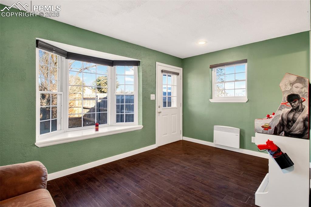 5226 Rocking R Drive Colorado Springs, CO 80915 - Photo 36 of 46 a living room with furniture and a window
