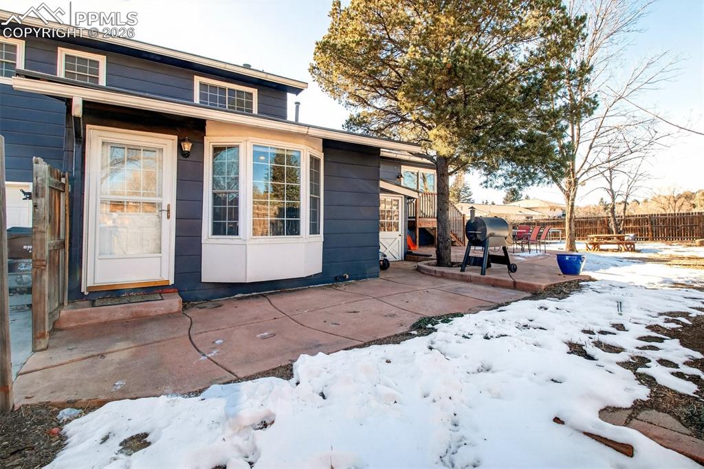 5226 Rocking R Drive Colorado Springs, CO 80915 - Photo 45 of 46 a street view with a building in the background