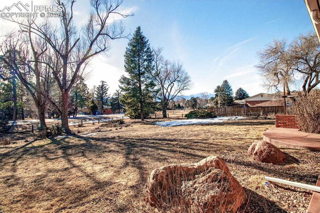 5226 Rocking R Drive Colorado Springs, CO 80915 - Photo 6 of 46 a view of outdoor space yard and trees