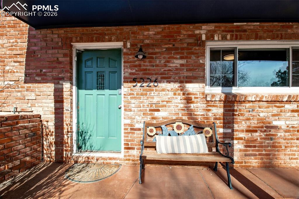 5226 Rocking R Drive Colorado Springs, CO 80915 - Photo 7 of 46 a view of a door of a house with a balcony