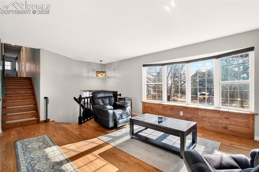 5226 Rocking R Drive Colorado Springs, CO 80915 - Photo 9 of 46 a living room with furniture and a window