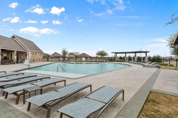 a view of a terrace with sitting area