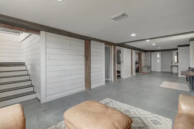 a view of a livingroom with closet and garage