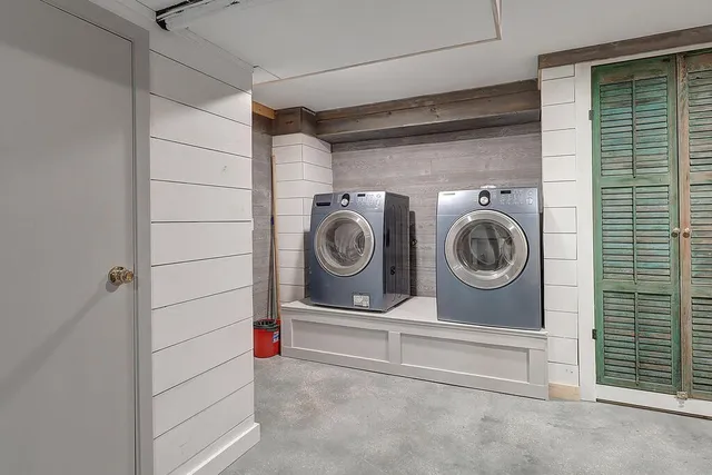 a view of washer and dryer in a utility room