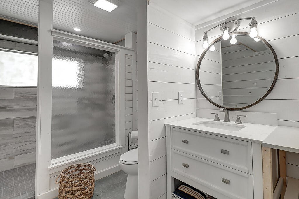 810 North Sandpiper Ingleside, TX 78362 - Photo 13 of 40 a bathroom with a sink and a mirror