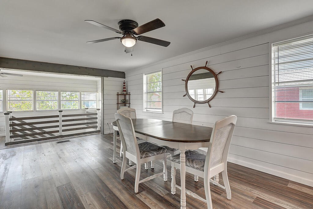 810 North Sandpiper Ingleside, TX 78362 - Photo 21 of 40 a view of a dining room with furniture window and wooden floor