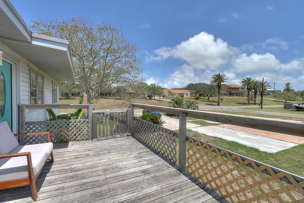 810 North Sandpiper Ingleside, TX 78362 - Photo 37 of 40 a view of a balcony with wooden floor
