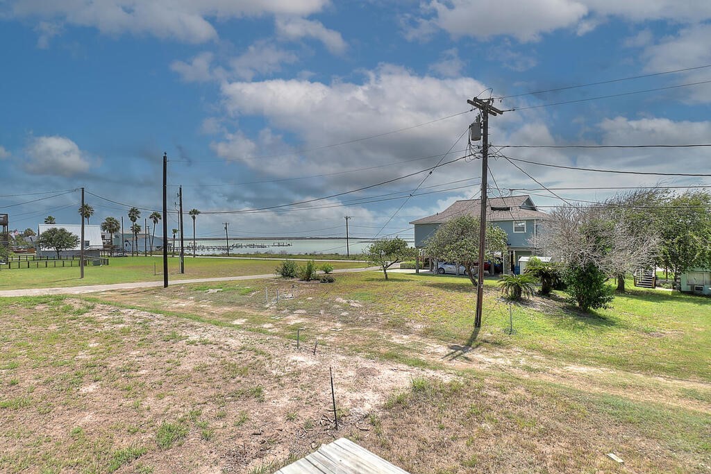 810 North Sandpiper Ingleside, TX 78362 - Photo 40 of 40 a view of a swimming pool with a yard