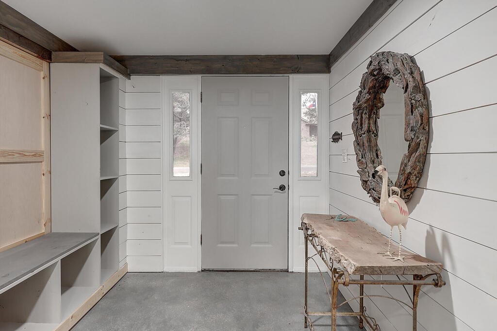 810 North Sandpiper Ingleside, TX 78362 - Photo 6 of 40 a view of a livingroom with wooden floor and a bathroom