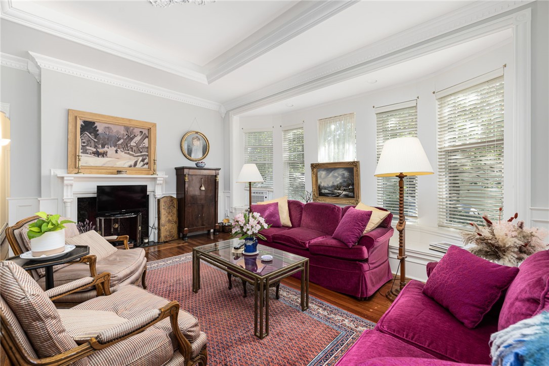 20 Berkeley Avenue, Unit 2 Newport, RI 02840 - Photo 13 of 46 Lovely window seat, and pretty fireplace and mantle, although none of the buildings fireplaces are in use.