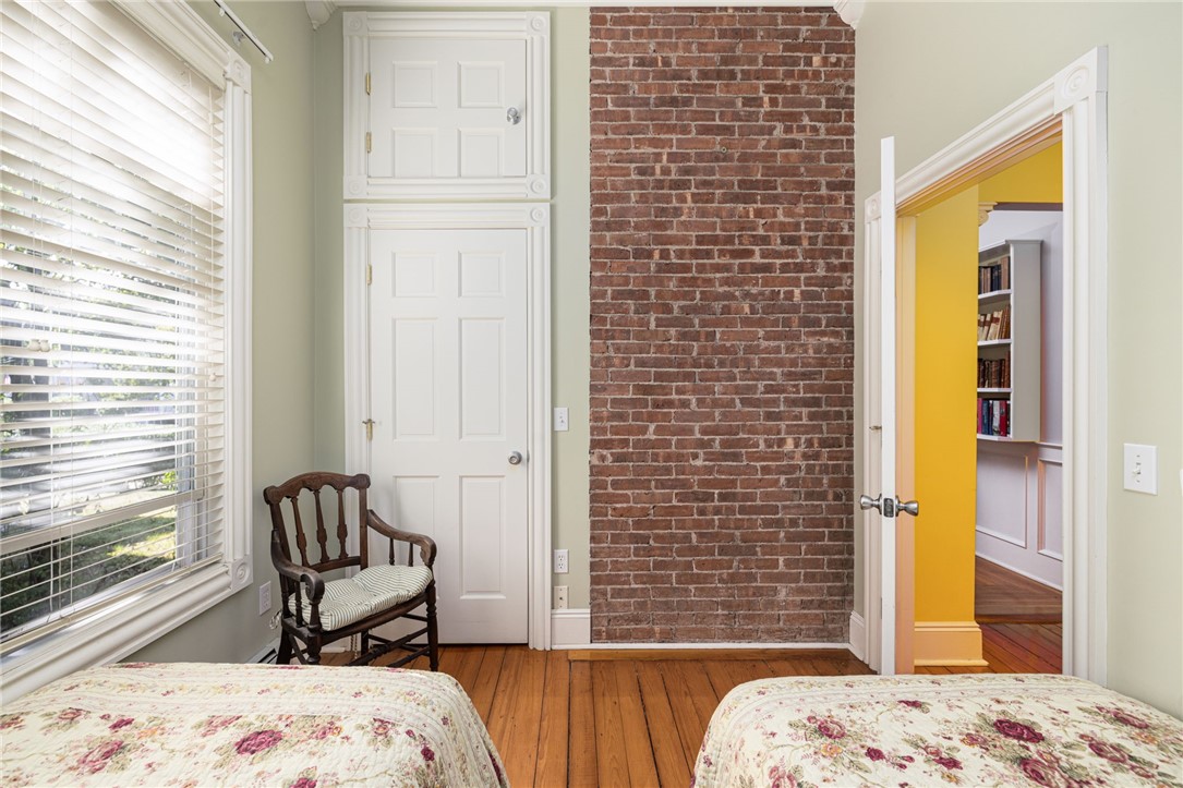 20 Berkeley Avenue, Unit 2 Newport, RI 02840 - Photo 17 of 46 Love the brick accent wall.