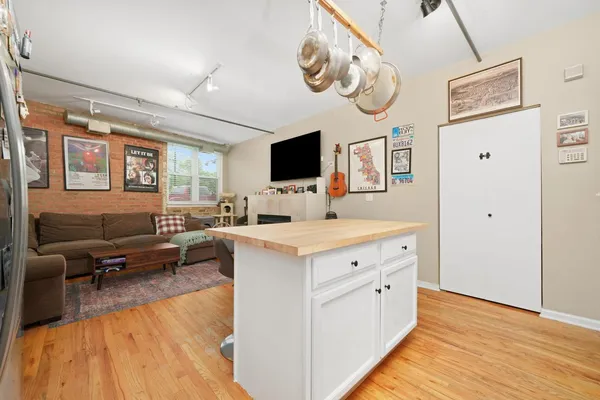a view of living room with furniture and flat screen tv