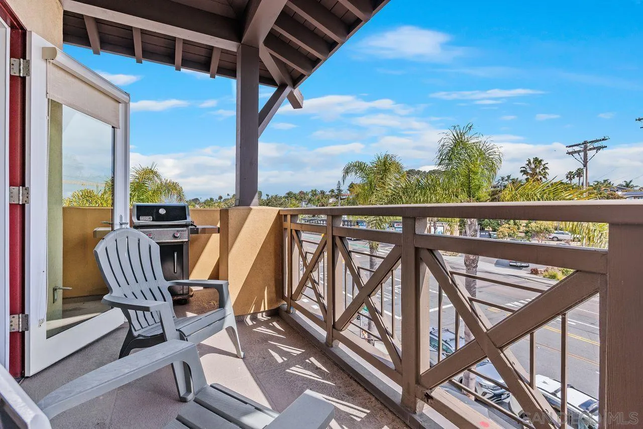 90 North Coast Highway 101 Encinitas, CA 92024 - Photo 12 of 39 a view of a chairs and table in the balcony