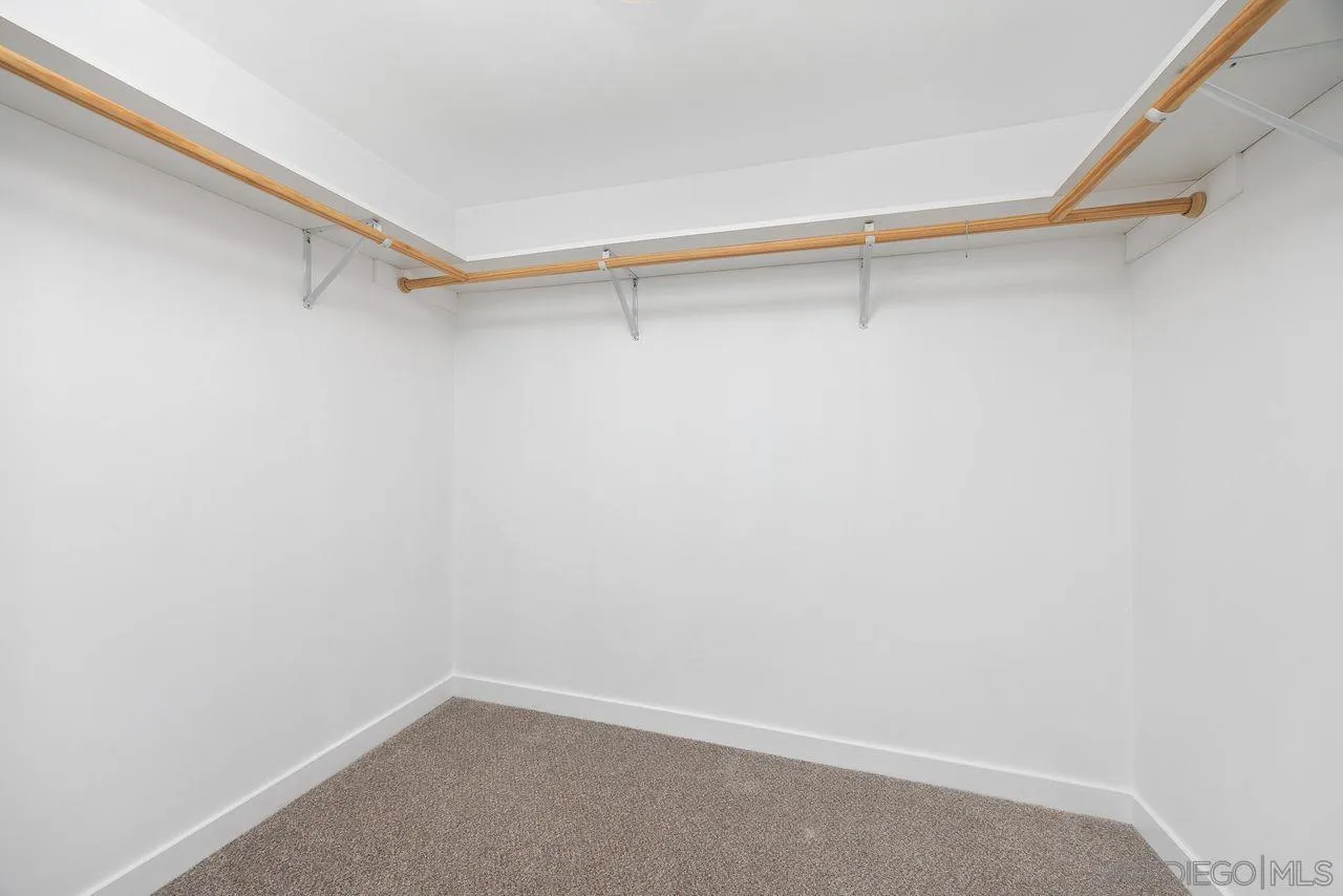 90 North Coast Highway 101 Encinitas, CA 92024 - Photo 26 of 39 a view of an empty walk in closet