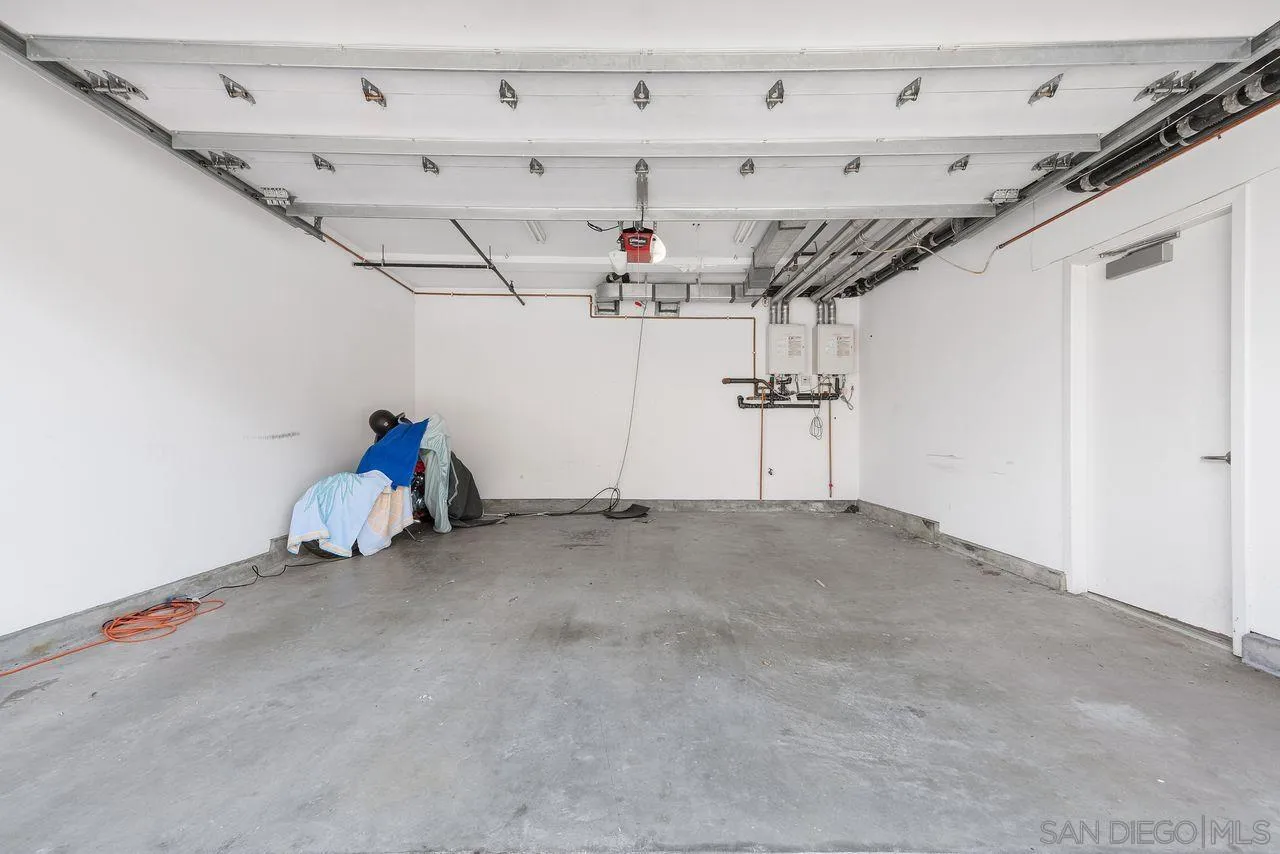 90 North Coast Highway 101 Encinitas, CA 92024 - Photo 33 of 39 a view of a garage with furniture