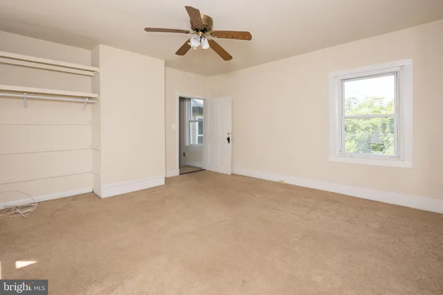 an empty room with windows