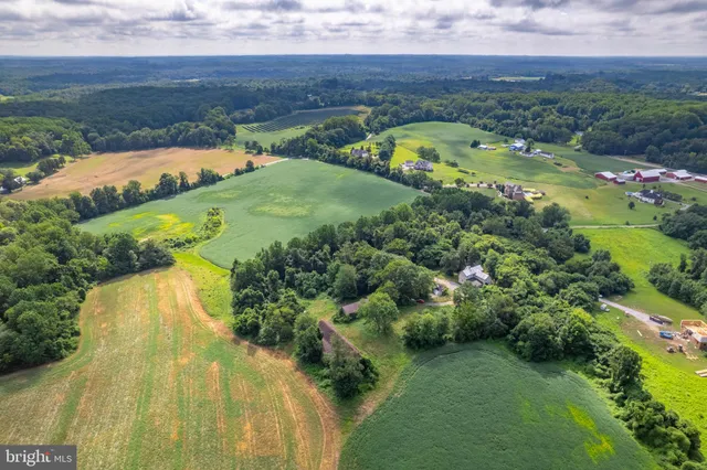 a view of a lake with a yard
