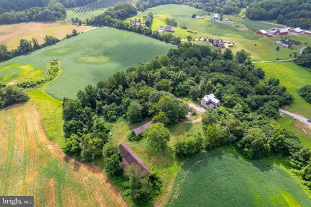 a view of a lake with a yard