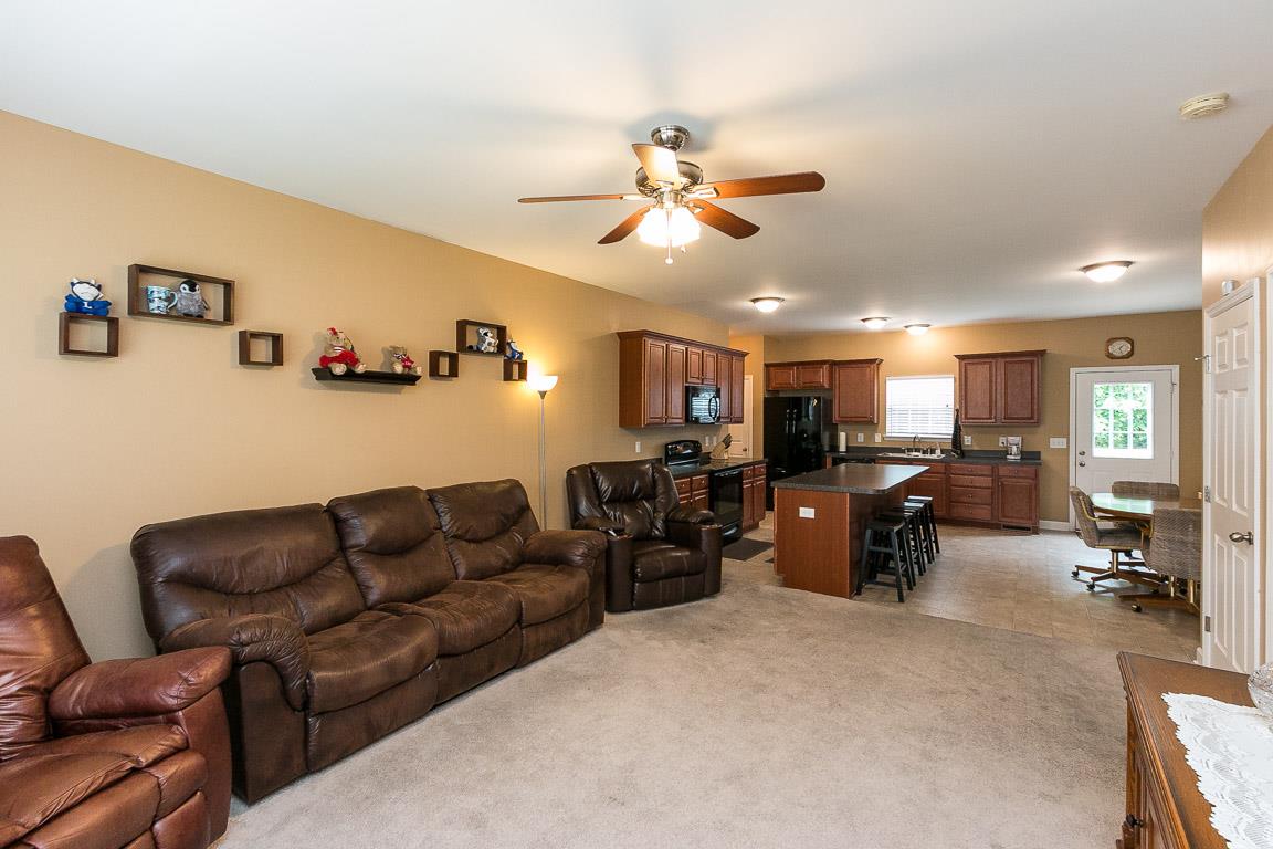 140 Abbey Road Lebanon, TN 37090 - Photo 3 of 30 a living room with furniture and a gym cycle