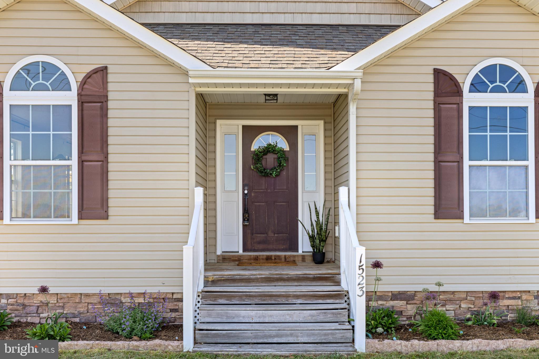1523 Bowie Road Colonial Beach, VA 22443 - Photo 25 of 34 a front view of a house with a porch