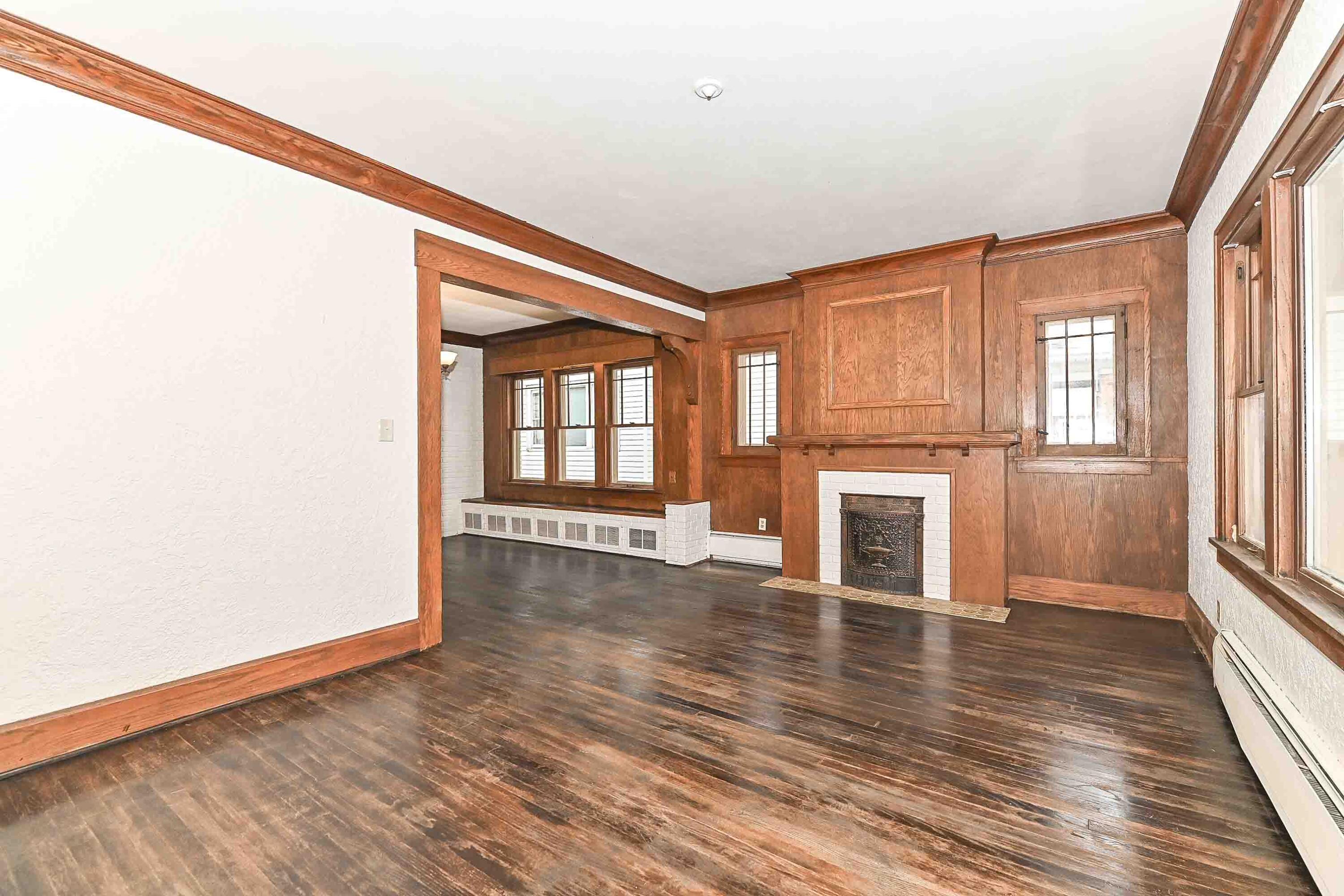 1516 Monroe Avenue Racine, WI 53405 - Photo 2 of 35 Freshly stained floors