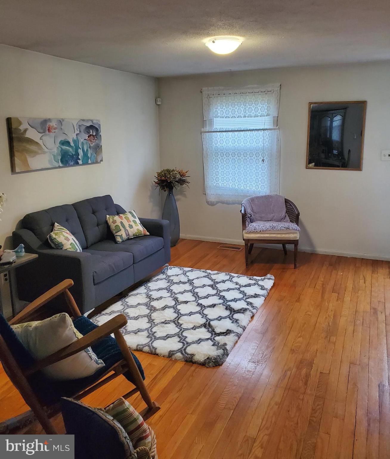 601 Banyan Road Edgewood, MD 21040 - Photo 3 of 31 a living room with a couch and a coffee table