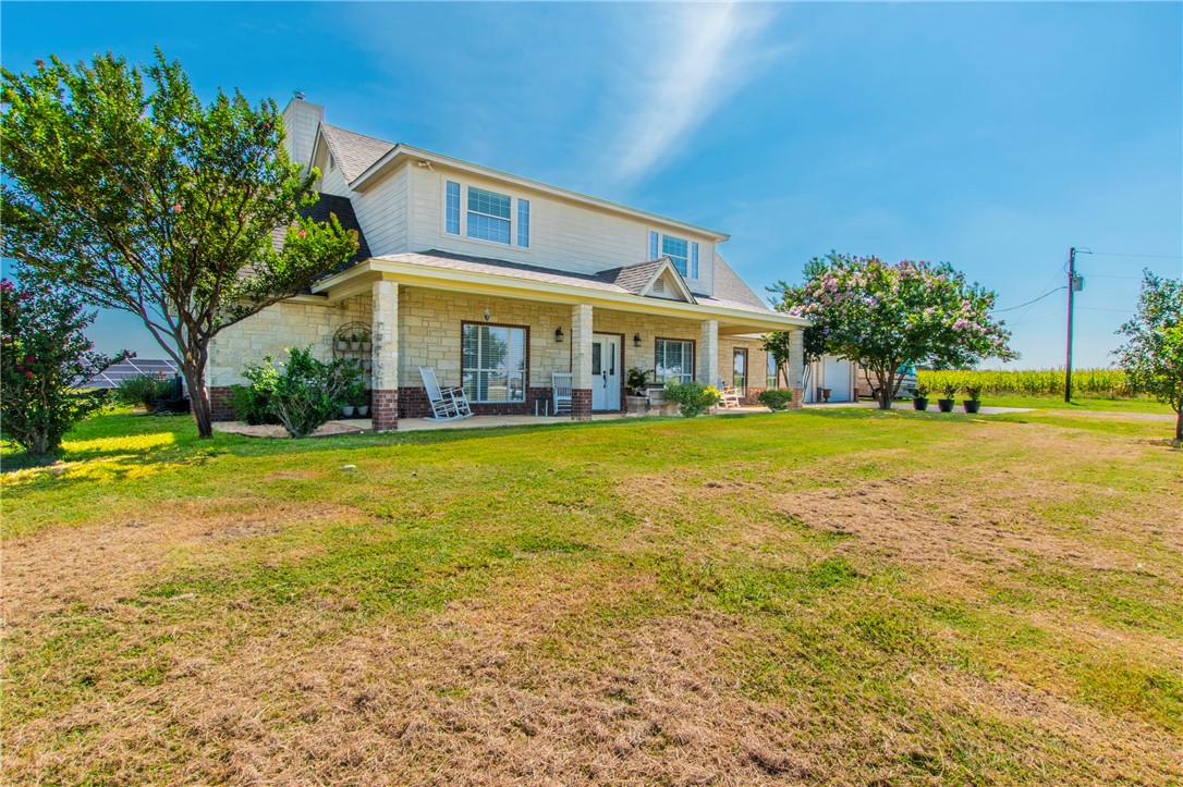 876 South St Joseph Road Burlington, TX 76519 - Photo 1 of 35 a front view of house with yard