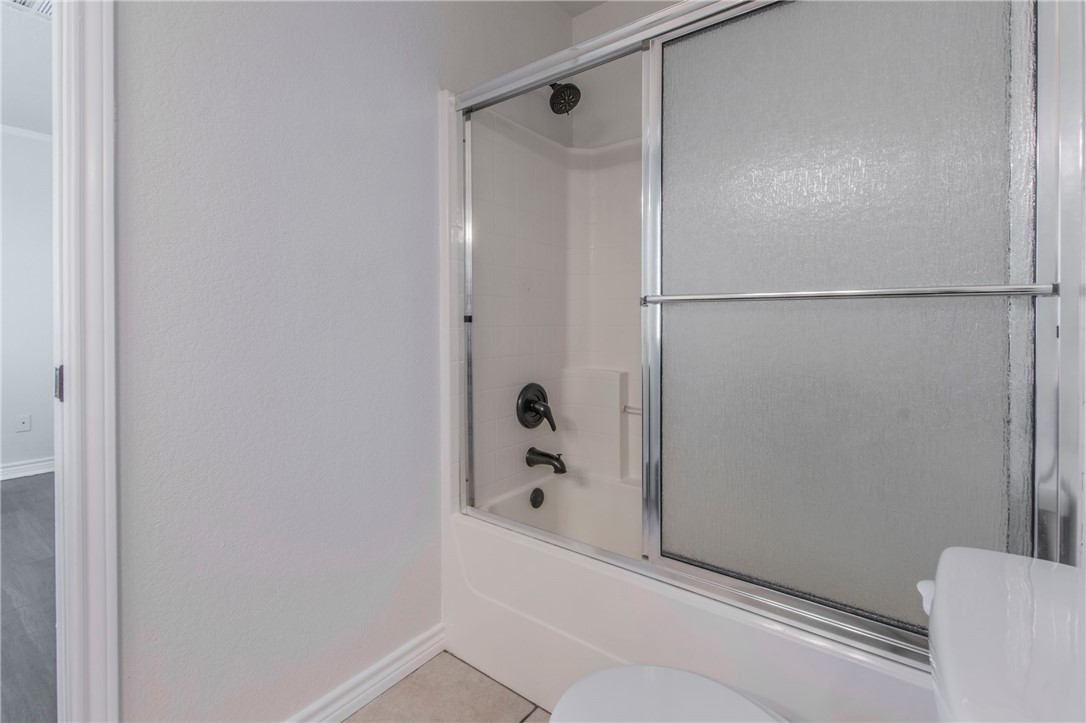 876 South St Joseph Road Burlington, TX 76519 - Photo 19 of 35 a bathroom with a shower