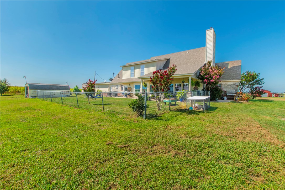 876 South St Joseph Road Burlington, TX 76519 - Photo 28 of 35 a front view of a house with garden
