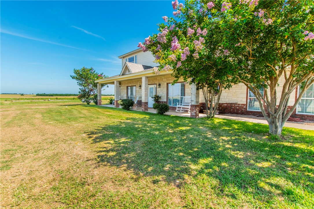 876 South St Joseph Road Burlington, TX 76519 - Photo 3 of 35 a front view of a house with garden