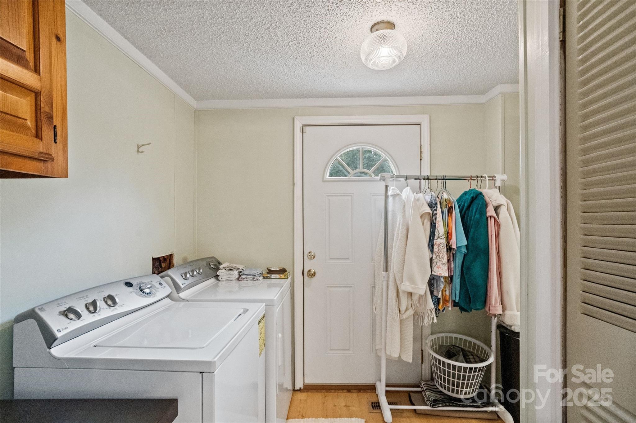 5909 Lake Valley Road Clover, SC 29710 - Photo 18 of 44 a utility room with dryer and washer
