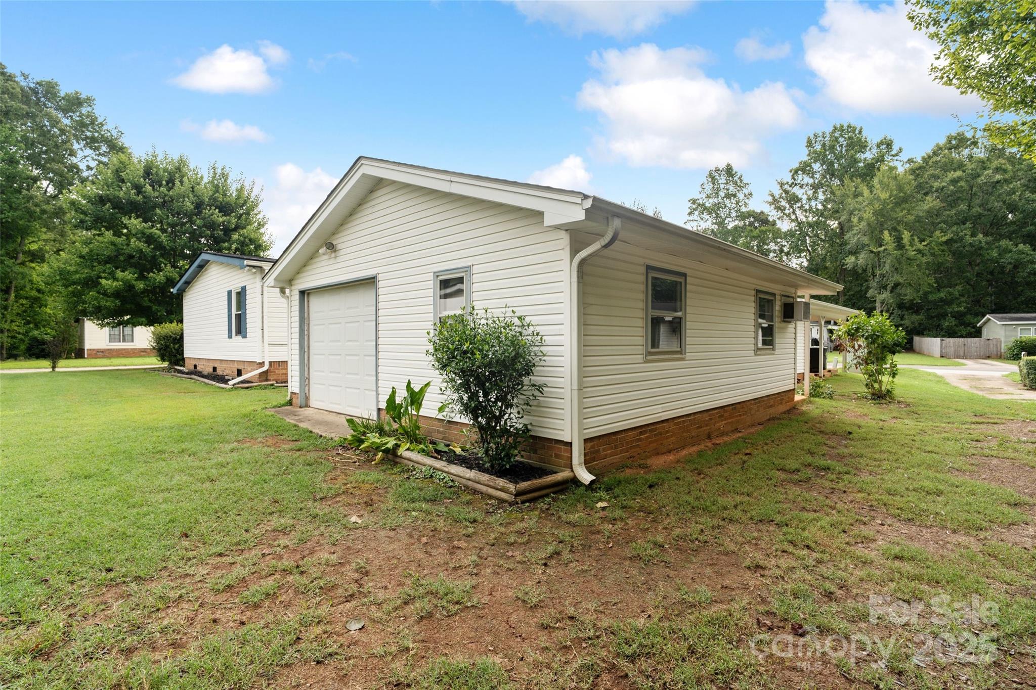 5909 Lake Valley Road Clover, SC 29710 - Photo 41 of 44 a view of a house with backyard