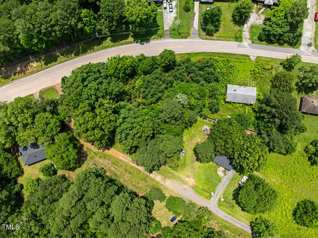 a view of a garden with a bench