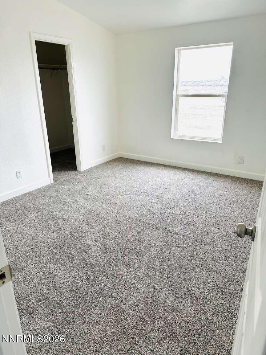 6255 Sierra Way Fallon, NV 89406 - Photo 14 of 25 an empty room with a window